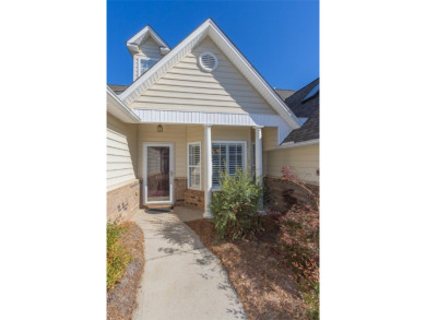 Experience maintenance-free living in this charming 3BD/2.5BA on Cobbs Glen Country Club in South Carolina - for sale on GolfHomes.com, golf home, golf lot