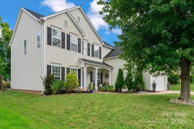 This spacious home offers versatile living,modern updates,and on Highland Creek Golf Club in North Carolina - for sale on GolfHomes.com, golf home, golf lot