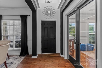 This spacious home offers versatile living,modern updates,and on Highland Creek Golf Club in North Carolina - for sale on GolfHomes.com, golf home, golf lot