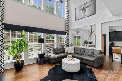 This spacious home offers versatile living,modern updates,and on Highland Creek Golf Club in North Carolina - for sale on GolfHomes.com, golf home, golf lot