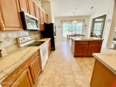 Looking for the home with a 3-car garage, water views, and golf on Sandpiper Bay Golf and Country Club in North Carolina - for sale on GolfHomes.com, golf home, golf lot