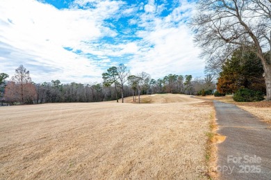 Nestled on the scenic Lake Hickory Country Club golf course on Lake Hickory Town Course in North Carolina - for sale on GolfHomes.com, golf home, golf lot