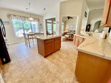 Looking for the home with a 3-car garage, water views, and golf on Sandpiper Bay Golf and Country Club in North Carolina - for sale on GolfHomes.com, golf home, golf lot