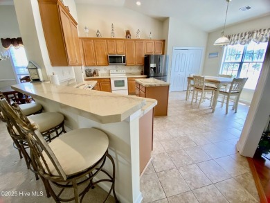 Looking for the home with a 3-car garage, water views, and golf on Sandpiper Bay Golf and Country Club in North Carolina - for sale on GolfHomes.com, golf home, golf lot