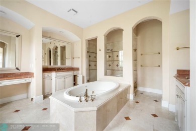 Nestled in the prestigious Parkland Golf and Country Club, this on Parkland Golf Club in Florida - for sale on GolfHomes.com, golf home, golf lot