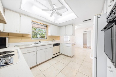 LISTED BELOW APPRAISED VALUE! Located in the highly sought after on Village Green Golf Club of Sarasota in Florida - for sale on GolfHomes.com, golf home, golf lot