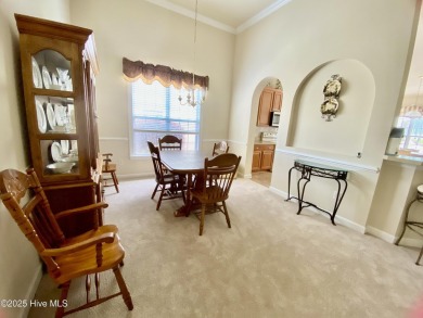 Looking for the home with a 3-car garage, water views, and golf on Sandpiper Bay Golf and Country Club in North Carolina - for sale on GolfHomes.com, golf home, golf lot