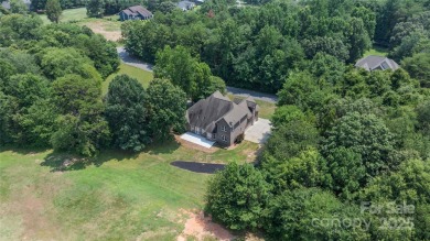 Welcome to 140 Pintail Run - beautifully renovated home nestled on Mallard Head Country Club in North Carolina - for sale on GolfHomes.com, golf home, golf lot