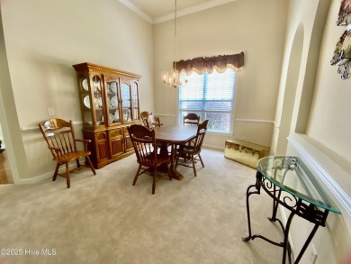 Looking for the home with a 3-car garage, water views, and golf on Sandpiper Bay Golf and Country Club in North Carolina - for sale on GolfHomes.com, golf home, golf lot