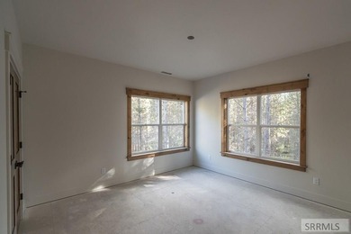 Discover mountain living at its finest in Island Park's first on Island Park Village Resort Golf Course in Idaho - for sale on GolfHomes.com, golf home, golf lot