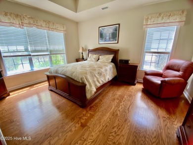 Looking for the home with a 3-car garage, water views, and golf on Sandpiper Bay Golf and Country Club in North Carolina - for sale on GolfHomes.com, golf home, golf lot