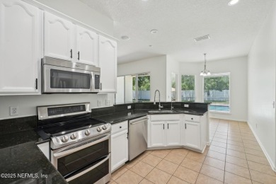 Motivated sellers welcome you to this immaculate 5BR/4BA pool on King and Bear Golf Course/World Golf Village in Florida - for sale on GolfHomes.com, golf home, golf lot