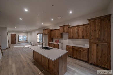 Discover mountain living at its finest in Island Park's first on Island Park Village Resort Golf Course in Idaho - for sale on GolfHomes.com, golf home, golf lot