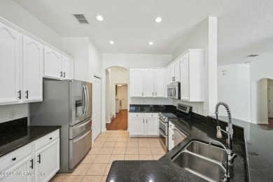 Motivated sellers welcome you to this immaculate 5BR/4BA pool on King and Bear Golf Course/World Golf Village in Florida - for sale on GolfHomes.com, golf home, golf lot
