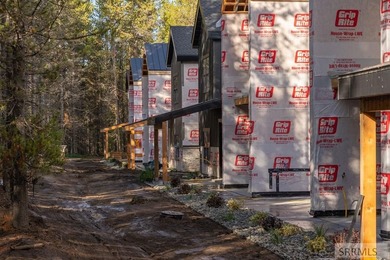 Discover mountain living at its finest in Island Park's first on Island Park Village Resort Golf Course in Idaho - for sale on GolfHomes.com, golf home, golf lot