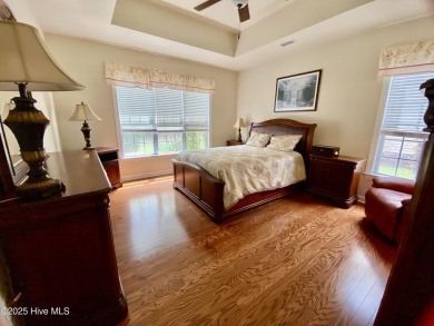 Looking for the home with a 3-car garage, water views, and golf on Sandpiper Bay Golf and Country Club in North Carolina - for sale on GolfHomes.com, golf home, golf lot