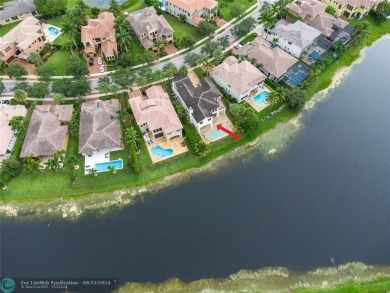 Nestled in the prestigious Parkland Golf and Country Club, this on Parkland Golf Club in Florida - for sale on GolfHomes.com, golf home, golf lot