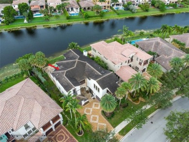 Nestled in the prestigious Parkland Golf and Country Club, this on Parkland Golf Club in Florida - for sale on GolfHomes.com, golf home, golf lot