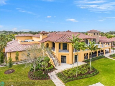 Nestled in the prestigious Parkland Golf and Country Club, this on Parkland Golf Club in Florida - for sale on GolfHomes.com, golf home, golf lot