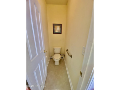 Looking for the home with a 3-car garage, water views, and golf on Sandpiper Bay Golf and Country Club in North Carolina - for sale on GolfHomes.com, golf home, golf lot