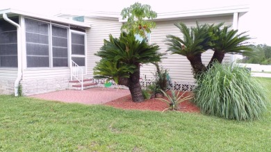 Gorgeous, updated, 3 bedroom, hard surface flooring and a garage on Schalamar Creek Golf and Country Club in Florida - for sale on GolfHomes.com, golf home, golf lot