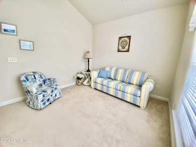 Looking for the home with a 3-car garage, water views, and golf on Sandpiper Bay Golf and Country Club in North Carolina - for sale on GolfHomes.com, golf home, golf lot