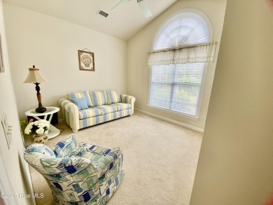 Looking for the home with a 3-car garage, water views, and golf on Sandpiper Bay Golf and Country Club in North Carolina - for sale on GolfHomes.com, golf home, golf lot