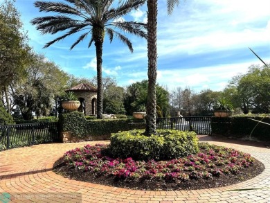 Nestled in the prestigious Parkland Golf and Country Club, this on Parkland Golf Club in Florida - for sale on GolfHomes.com, golf home, golf lot