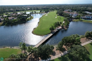 Nestled in the prestigious Parkland Golf and Country Club, this on Parkland Golf Club in Florida - for sale on GolfHomes.com, golf home, golf lot