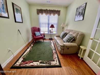 Looking for the home with a 3-car garage, water views, and golf on Sandpiper Bay Golf and Country Club in North Carolina - for sale on GolfHomes.com, golf home, golf lot
