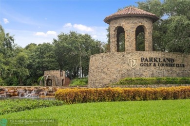 Nestled in the prestigious Parkland Golf and Country Club, this on Parkland Golf Club in Florida - for sale on GolfHomes.com, golf home, golf lot