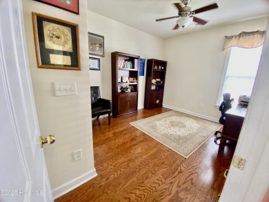 Looking for the home with a 3-car garage, water views, and golf on Sandpiper Bay Golf and Country Club in North Carolina - for sale on GolfHomes.com, golf home, golf lot