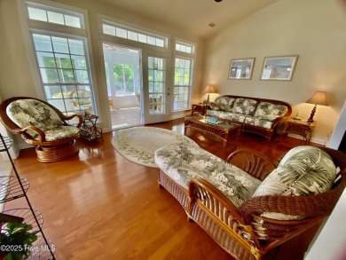 Looking for the home with a 3-car garage, water views, and golf on Sandpiper Bay Golf and Country Club in North Carolina - for sale on GolfHomes.com, golf home, golf lot