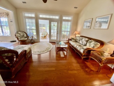 Looking for the home with a 3-car garage, water views, and golf on Sandpiper Bay Golf and Country Club in North Carolina - for sale on GolfHomes.com, golf home, golf lot