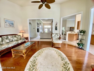 Looking for the home with a 3-car garage, water views, and golf on Sandpiper Bay Golf and Country Club in North Carolina - for sale on GolfHomes.com, golf home, golf lot