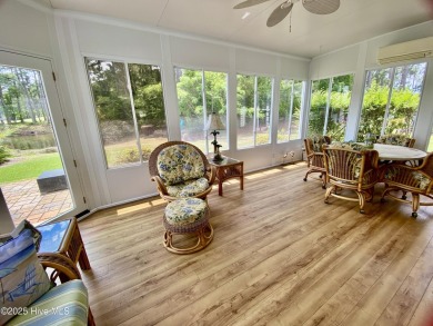 Looking for the home with a 3-car garage, water views, and golf on Sandpiper Bay Golf and Country Club in North Carolina - for sale on GolfHomes.com, golf home, golf lot