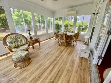 Looking for the home with a 3-car garage, water views, and golf on Sandpiper Bay Golf and Country Club in North Carolina - for sale on GolfHomes.com, golf home, golf lot