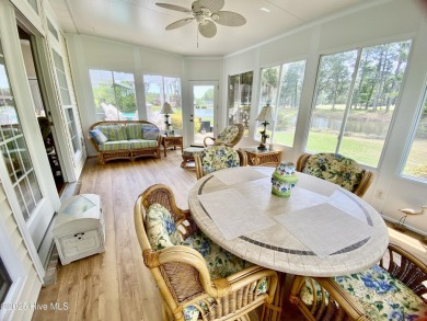 Looking for the home with a 3-car garage, water views, and golf on Sandpiper Bay Golf and Country Club in North Carolina - for sale on GolfHomes.com, golf home, golf lot