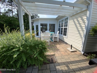 Looking for the home with a 3-car garage, water views, and golf on Sandpiper Bay Golf and Country Club in North Carolina - for sale on GolfHomes.com, golf home, golf lot