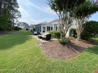 Looking for the home with a 3-car garage, water views, and golf on Sandpiper Bay Golf and Country Club in North Carolina - for sale on GolfHomes.com, golf home, golf lot