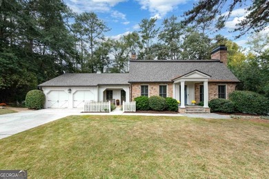 Beautifully situated on a peaceful 1.2-acre lot in one of on North Fulton Golf Course in Georgia - for sale on GolfHomes.com, golf home, golf lot