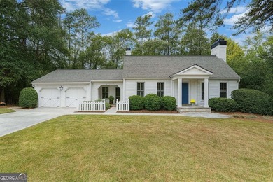 Beautifully situated on a peaceful 1.2-acre lot in one of on North Fulton Golf Course in Georgia - for sale on GolfHomes.com, golf home, golf lot