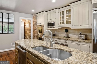 Beautifully situated on a peaceful 1.2-acre lot in one of on North Fulton Golf Course in Georgia - for sale on GolfHomes.com, golf home, golf lot