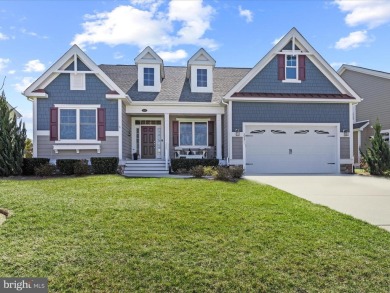 Welcome to this beautiful pond-front home, perfectly situated in on The Peninsula Golf and Country Club in Delaware - for sale on GolfHomes.com, golf home, golf lot