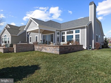 Welcome to this beautiful pond-front home, perfectly situated in on The Peninsula Golf and Country Club in Delaware - for sale on GolfHomes.com, golf home, golf lot