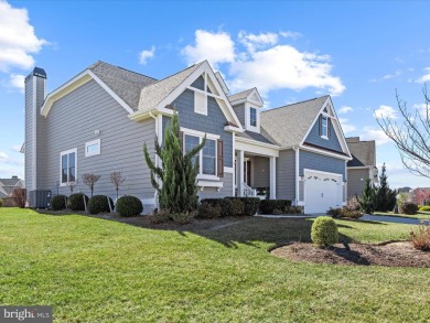 Welcome to this beautiful pond-front home, perfectly situated in on The Peninsula Golf and Country Club in Delaware - for sale on GolfHomes.com, golf home, golf lot