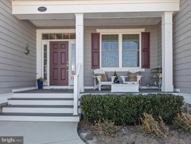 Welcome to this beautiful pond-front home, perfectly situated in on The Peninsula Golf and Country Club in Delaware - for sale on GolfHomes.com, golf home, golf lot