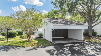Welcome to this beautifully maintained 3-bedroom, 2-bathroom on Carrollwood Country Club in Florida - for sale on GolfHomes.com, golf home, golf lot