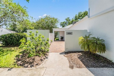 Welcome to this beautifully maintained 3-bedroom, 2-bathroom on Carrollwood Country Club in Florida - for sale on GolfHomes.com, golf home, golf lot