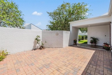 Welcome to this beautifully maintained 3-bedroom, 2-bathroom on Carrollwood Country Club in Florida - for sale on GolfHomes.com, golf home, golf lot